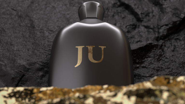 Nahaufname einer 3D-Visualisierung eines schwarzen Parfum-Flacons mit den Initialen JU